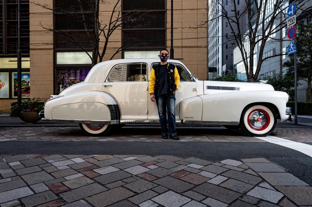 Eksekutif syarikat kenderaan, Yuji Nakayama bersama kereta 1941 Cadillac. Gambar: Phillip Fong, AFP
