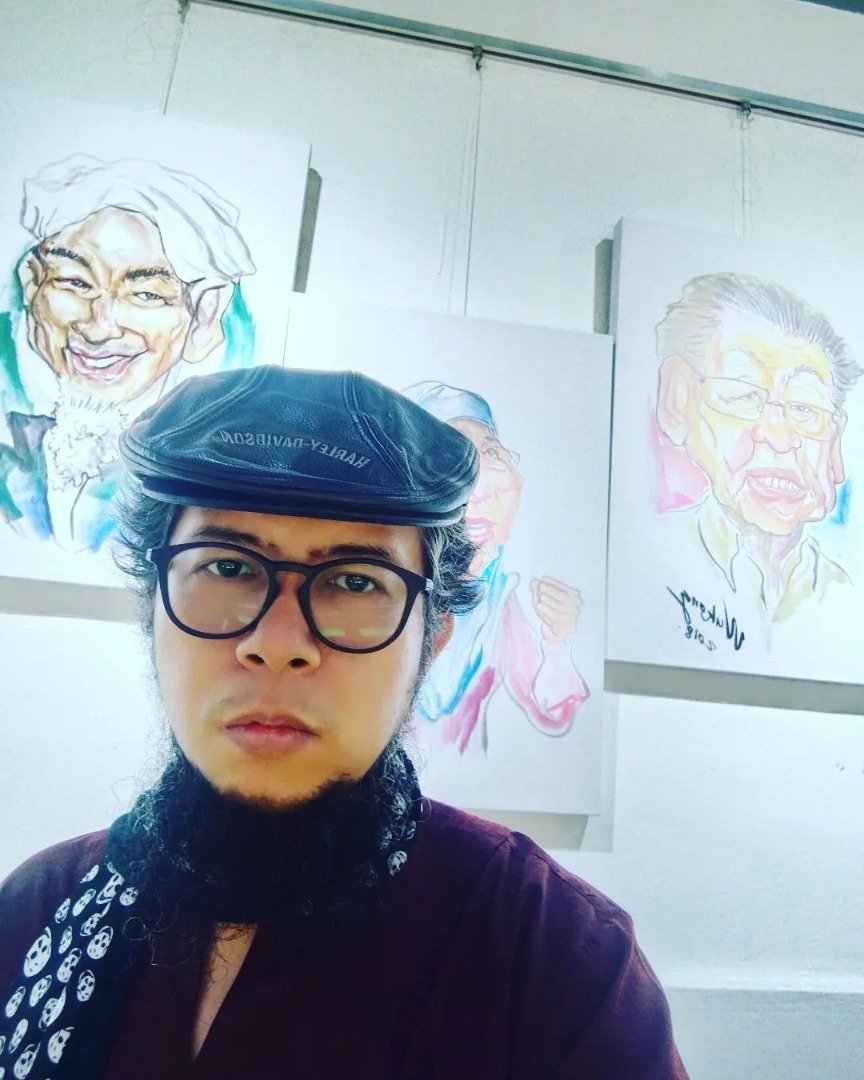 Salah seorang pengkarya yang terlibat dalam pameran 'Wajah-Wajah Malaysia', Wukong
