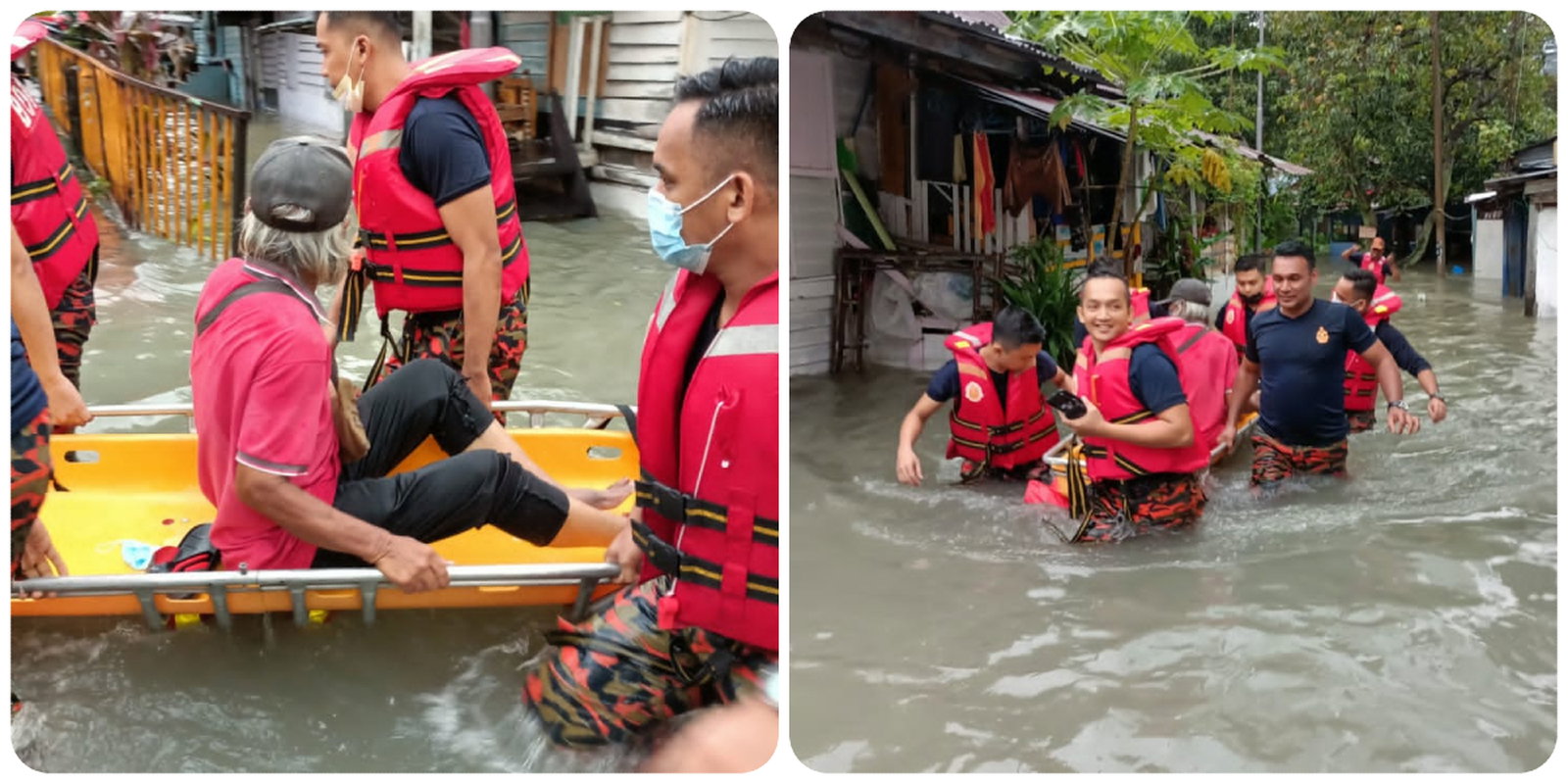 Anggota Bomba memindahkan seorang warga emas selepas rumahnya di Kampung Periuk, Jalan Raja Bot dinaiki air.