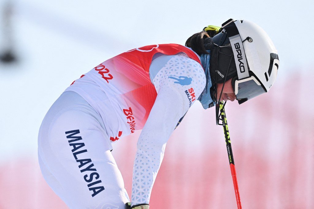 Reaksi Aruwin Salehhuddin, peserta Malaysia selepas menamatkan acara slalom wanita. - Gambar AFP